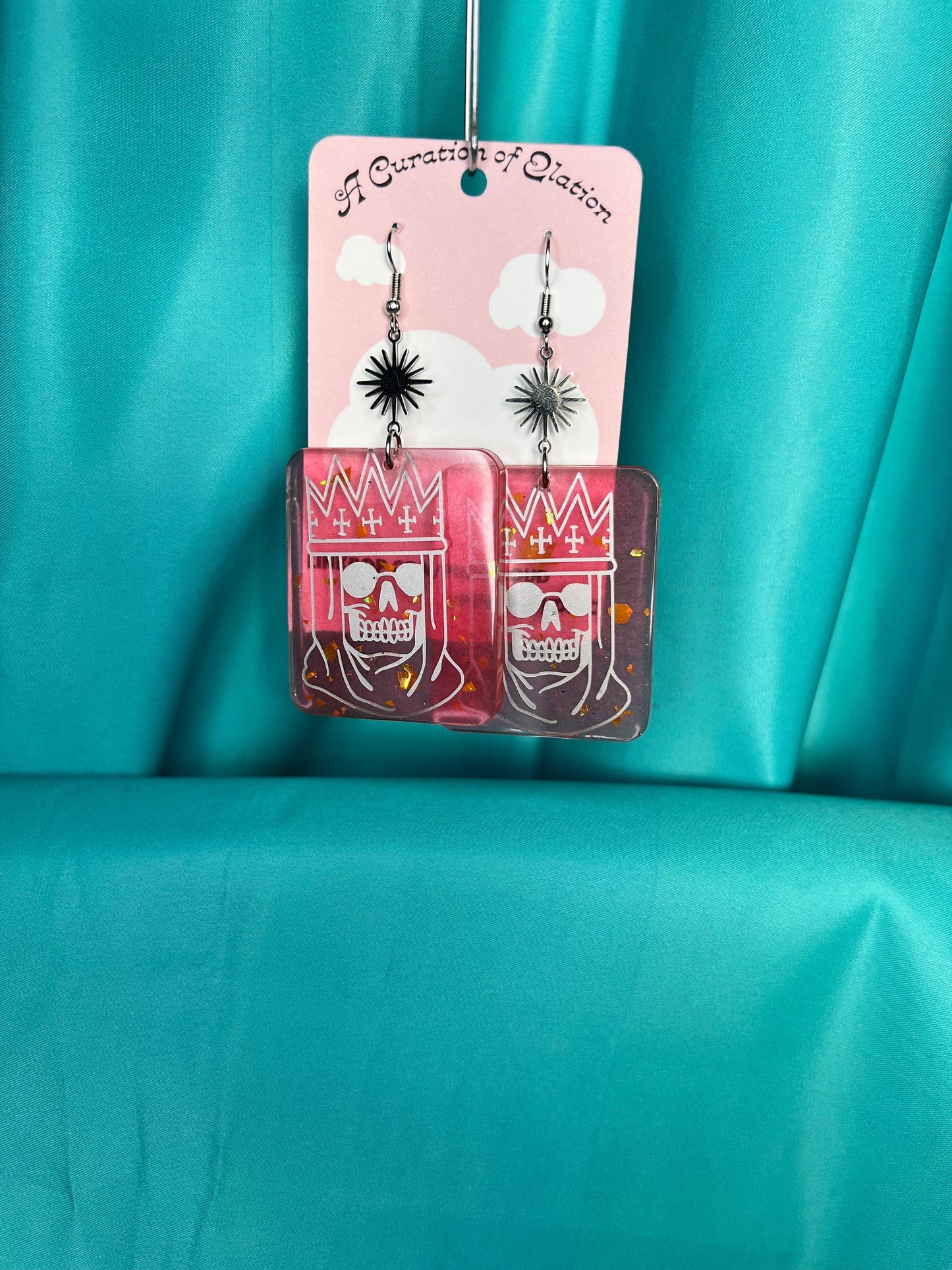 Handmade Long Dangle Earrings red and orange glitter rectangle with silver royal skull decal