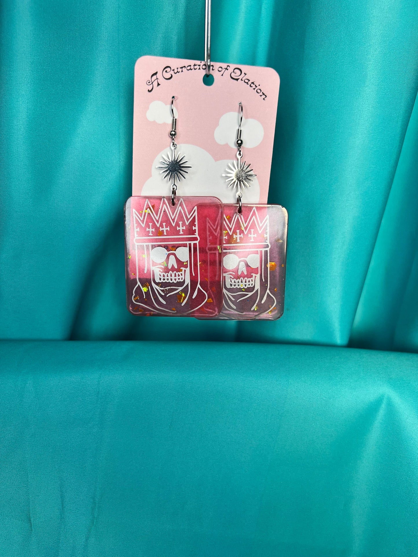 Handmade Long Dangle Earrings red and orange glitter rectangle with silver royal skull decal