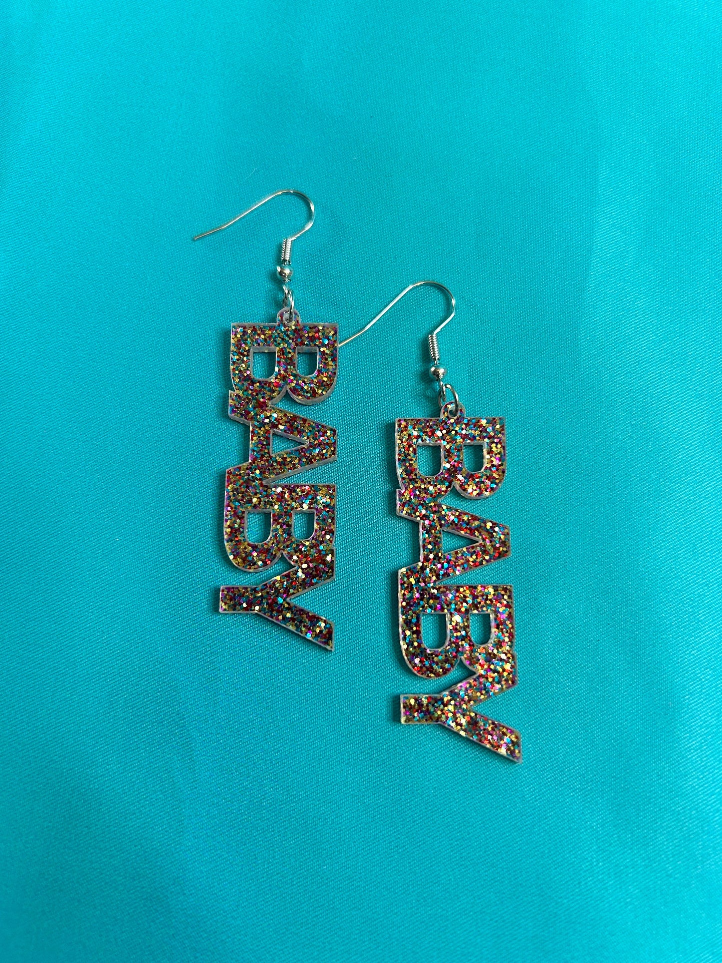 Outspoken Acrylic Statement Earrings: Glittery Political Jewelry